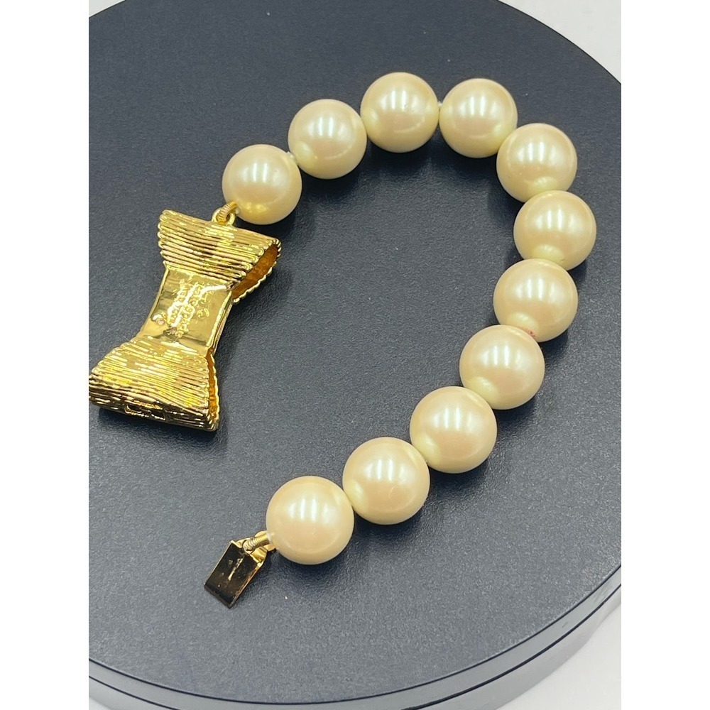 Kate Spade All Wrapped Up Pearl Gold Bow Bracelet - Picture 10 of 13